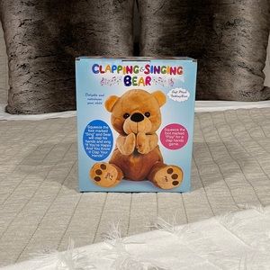 Clapping singing bear